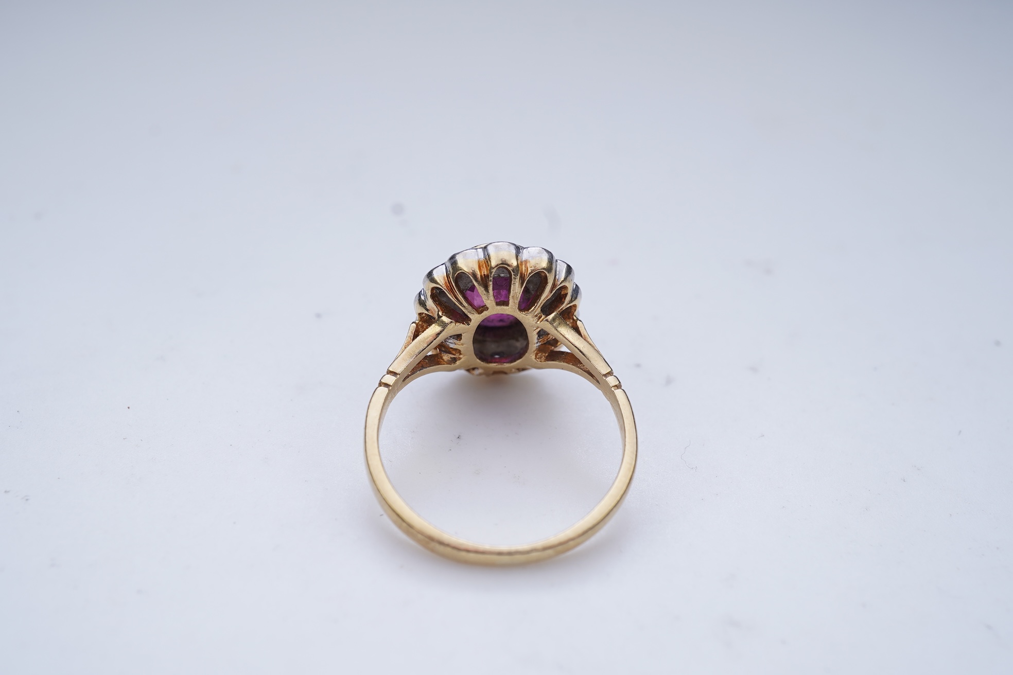 A ruby and diamond cluster ring